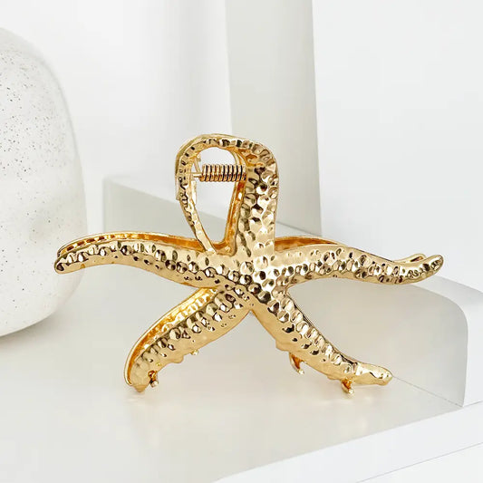 HAIR CLAW STAR FISH GOLD